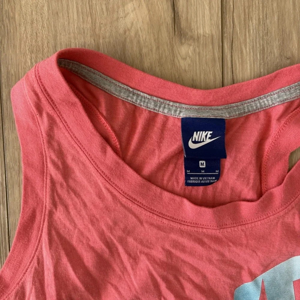 Nike Women's Medium Muscle Cut‎ Off Sleeveless Tank Top Pink